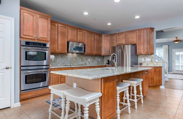 Amazing 4 Bedroom Sunset Island Townhome with Bonus Den!