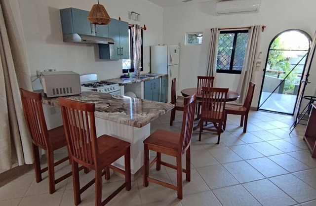 Amazing 4 Bedroom Home with 2 separate apartments 3 kitchens and a swimming pool