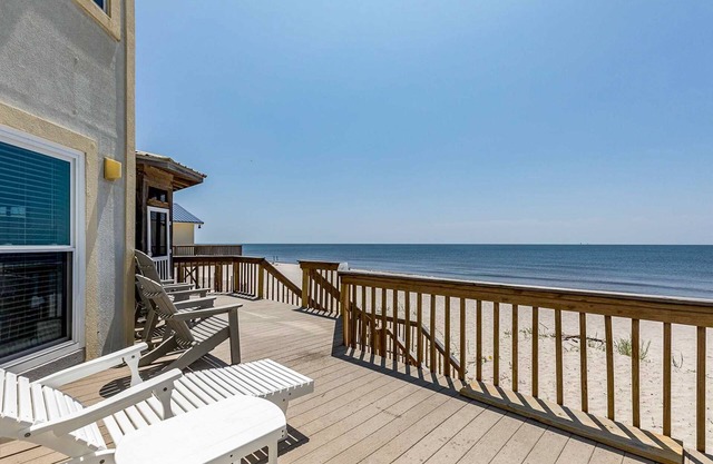 Amazing beachfront home with private balcony, deck, central A/C, free WiFi