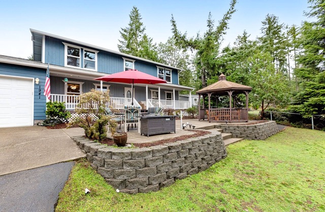 Amazing lake retreat with game room, firepit, private hot tub, & tranquil views