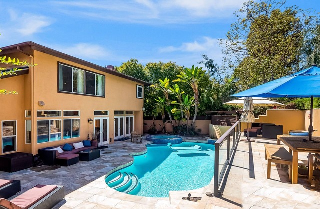 Amazing house with pool, hot tub, landscaped patio, grill, AC, & kid's playhouse