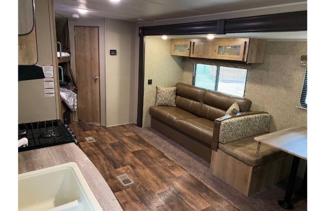 Amazing RV with bunks and enclosed Master