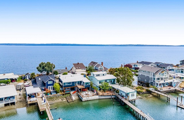 Amazing waterfront home with 360-degree views, chef’s kitchen, game room, patio