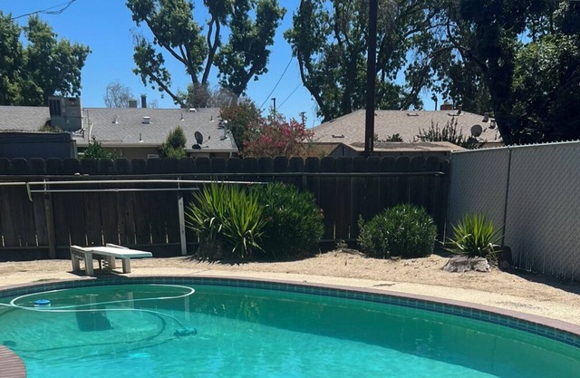 Amenities Galore From Pool to Bocce Ball Court to Fire Pit to Hammock Await You