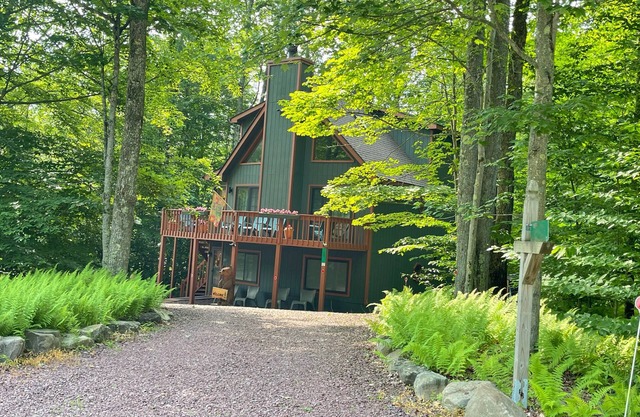 An Ultimate Pocono Lake Retreat Awaits,3 Level home with 4 Bdr, 5 beds & 3 Baths