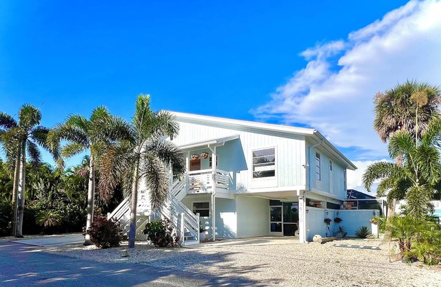 Antigua Cay Retreat is a stylish home with pool on deep water canal in Bokeelia