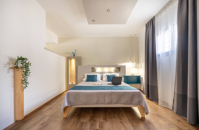 Ferienwohnung 'Appartament Zino' mit gemeinsamer Terrasse, WLAN und Klimaanlage