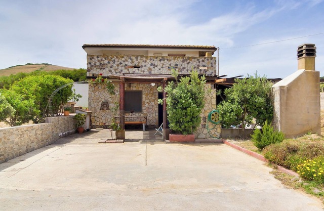 Apartment "Appartamento Nuraghe" mit Klimaanlage, WLAN, Garten und Terrasse