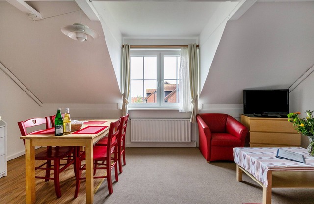 Ferienwohnung 'Atlanta 206' mit gemeinsamer Terrasse, privatem Garten und WLAN
