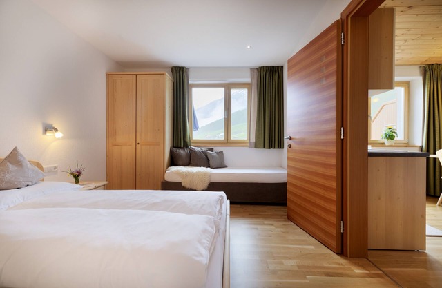 Ferienwohnung 'Ausserglieshof Wohnung Portles' mit Bergblick, Gemeinschaftsgarten und WLAN