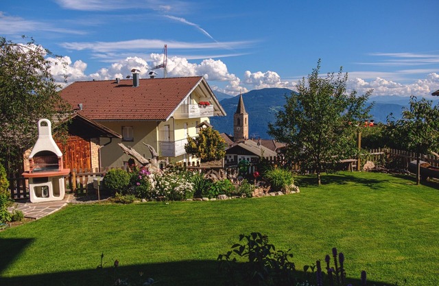 Ferienwohnung 'Beckenbinder Latemar' mit Garten, WLAN & Bergblick