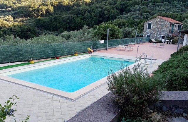 Apartment "Bilocale Terra" mit Bergblick, Pool, WLAN, Klimaanlage, Terrasse und Garten
