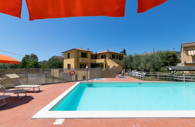 Ferienwohnung "Bilocale Moraiolo" mit Balkon, Gemeinschaftspool und WLAN