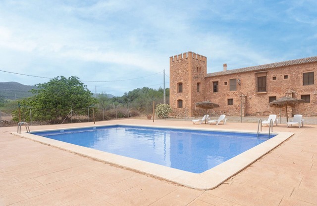 Ferienwohnung 'Blanca' mit Bergblick, Gemeinschaftspool und Gemeinschaftsgarten