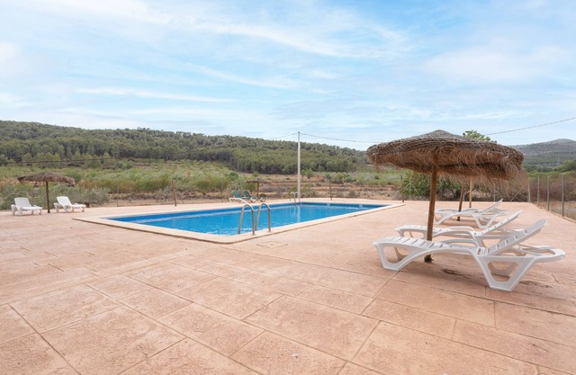 Ferienwohnung 'Bruno' mit Bergblick, Gemeinschaftspool und Gemeinschaftsgarten