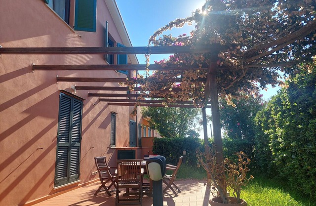 Apartment Cala Azzurra - with large garden and a stone's throw from the sea