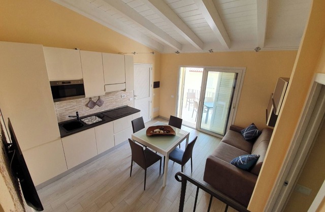 Ferienwohnung 'Caprera' mit privater Terrasse, WLAN und Klimaanlage
