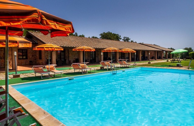 Ferienwohnung 'Casa Vacanza Il Carpignone 1' mit Seeblick, Pool & Garten