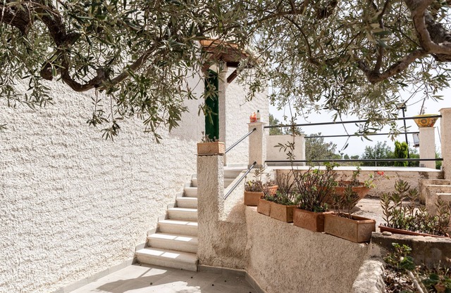Ferienwohnung 'Casa Leonardo' mit gemeinsamer Terrasse, privatem Garten und Klimaanlage
