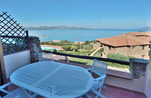Apartment 'Casa Vacanze Li Cuncheddi' with Sea View, Shared Pool and Private Terrace
