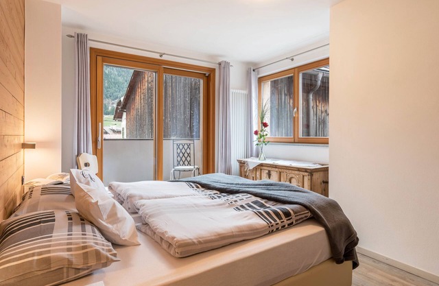 Ferienwohnung 'Ciasa Majonade Pozza Di Fassa Tipo2' mit Bergblick, Gemeinschaftsgarten und WLAN