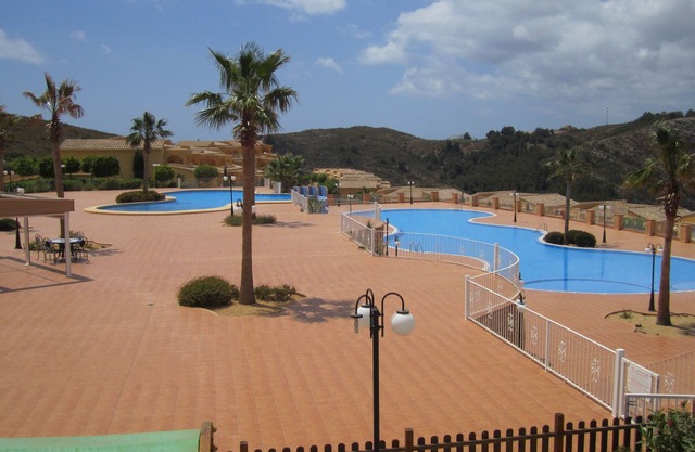 GEMEINSCHAFTLICHE SWIMMINGPOOLWOHNUNG IN CUMBRE DEL SOL MIT SCHÖNER AUSSICHT