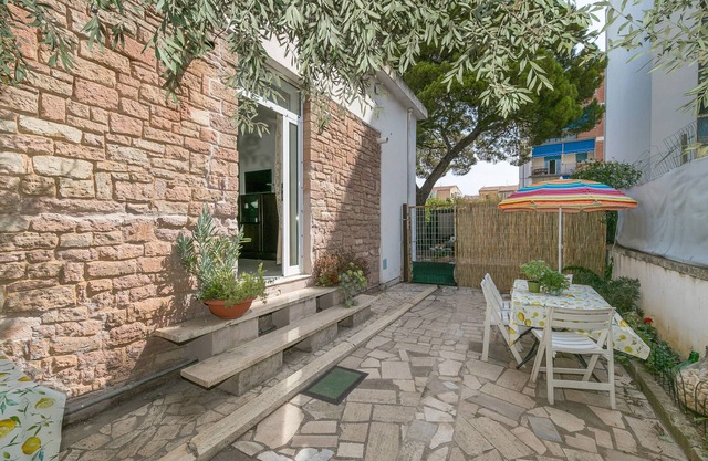 Ferienwohnung "Con Giardino a due Passi dal Mare" mit Privatem Garten und WLAN
