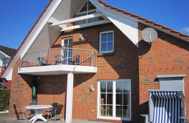 Wohnung ''dat Rode Huus' - Ferienwohnung' mit privater Terrasse, privatem Garten und Wi-Fi