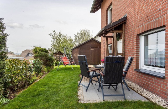 Ferienwohnung Am Wald" mit privater Terrasse, Gemeinschaftsgarten und WLAN