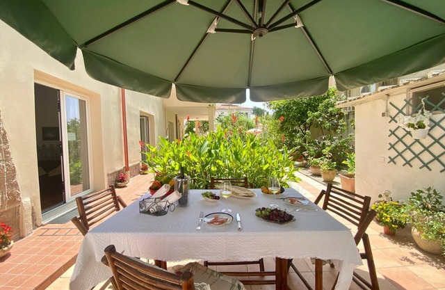 Wohnung für 4 Personen mit Blick auf den Strand mit Garten