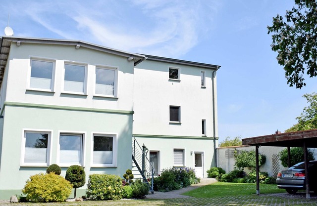 Ferienwohnung 'Gartenblick' mit gemeinsamer Terrasse, privatem Garten und Wi-Fi