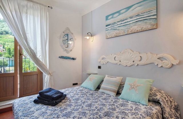 Ferienwohnung 'Hilary House' mit Balkon