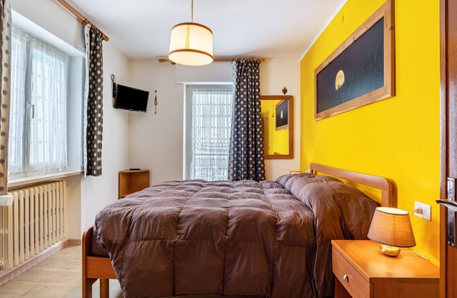 Ferienwohnung "House Cuel Milena Folgaria - Yellow" mit Bergblick und Gemeinschaftsgarten
