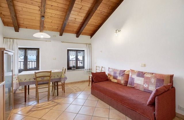 Ferienwohnung Haus Predaia mit Bergblick, Garten und WiFi