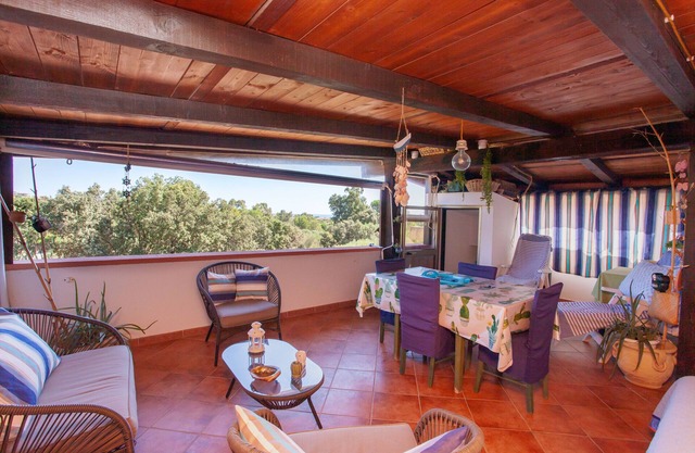 Ferienwohnung 'House Two Steps from the Sea' mit Terrasse und Klimaanlage