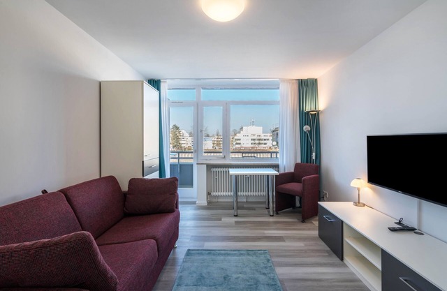 Ferienwohnung 'Huber Living Single Plus 211' mit Balkon und WLAN