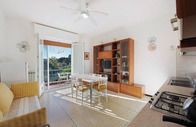 Ferienwohnung 'Il Corallo' mit Gemeinschaftsgarten und -balkon
