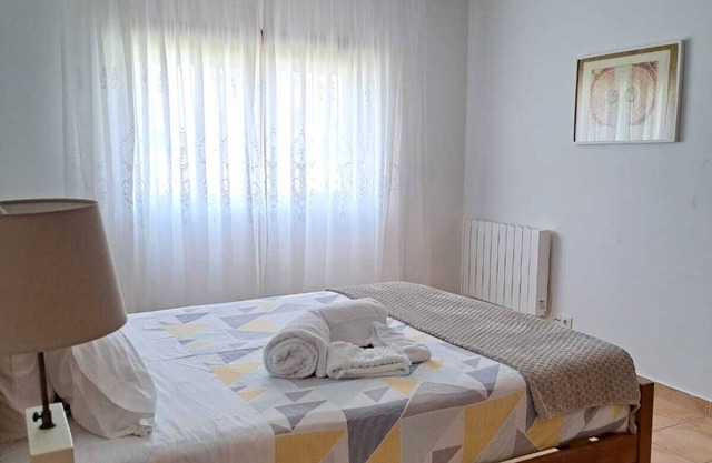 Apartment in condominium with pool, garden and garage