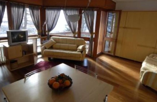 Apartment in front of ski slopes