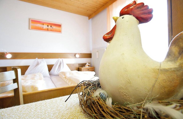 Ferienwohnung "Angerle Alm Apt Rosengarten" mit Privatem Balkon, Gemeinschaftsgarten und WLAN
