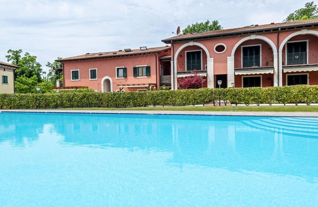 Ferienwohnung 'Residenz Corte La Fiorita' mit Gemeinschaftspool, WLAN und Klimaanlage