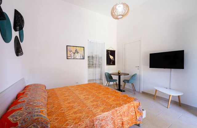 Ferienwohnung 'Mezzogiorno' mit gemeinsamer Terrasse, WLAN und Klimaanlage