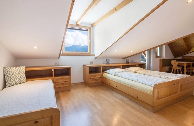 Ferienwohnung 'Kortscherhof Apt Typ 5' mit Bergblick, Gemeinschaftsgarten und WLAN