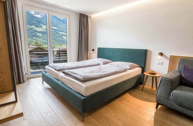 Ferienwohnung 'Kortscherhof Apt Typ 6-3' mit Bergblick, Gemeinschaftsgarten und WLAN