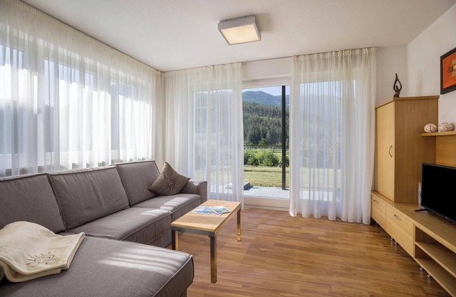 Ferienwohnung "Kronsun - Freude" mit Bergblick, WLAN, Terrasse & Garten