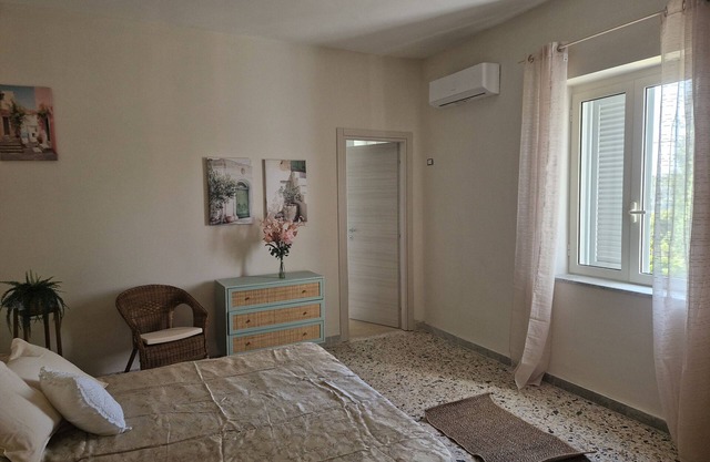 Ferienwohnung 'L'Orchidea' mit privatem Garten, Wi-Fi und Klimaanlage
