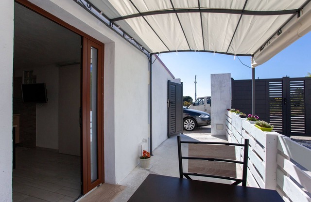 Apartment "La Caletta Vacanze" close to the Sea with Private Terrace & Wi-Fi