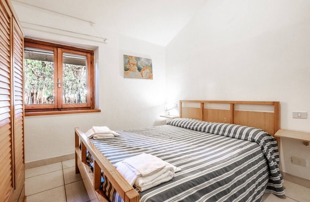 Ferienwohnung 'La Capannuccia C' mit gemeinschaftlichem Garten, WLAN und Klimaanlage