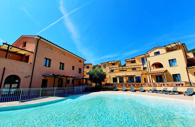 Ferienwohnung "La Pergola al Cavo 5" in der Nähe dem Strand mit Gemeinschaftspool & WLAN