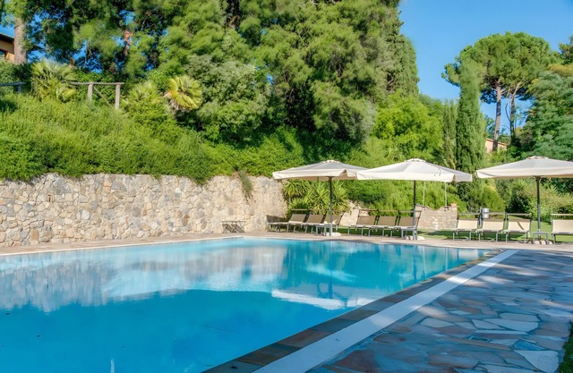 Ferienwohnung 'Le Tre Civette' mit Gemeinschaftspool, privatem Garten und WLAN